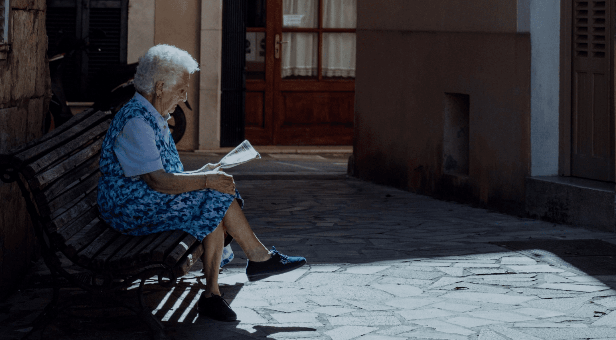 Elderly woman reading